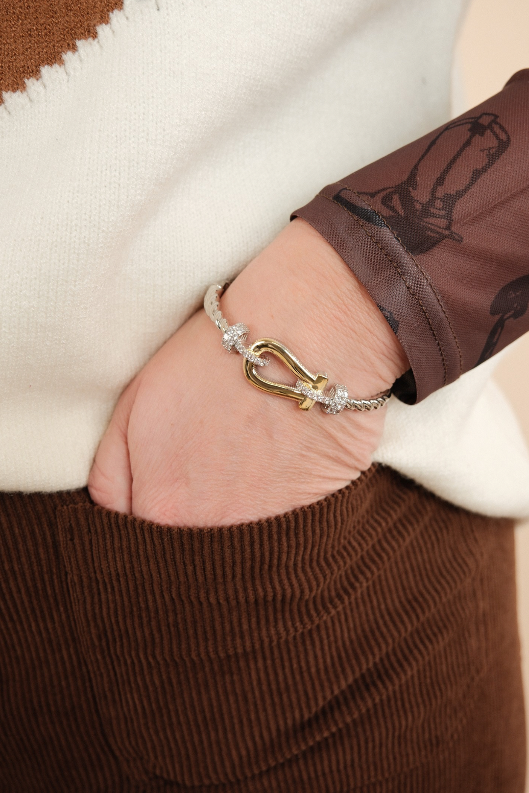 Golden Twist Stirrup Bangle