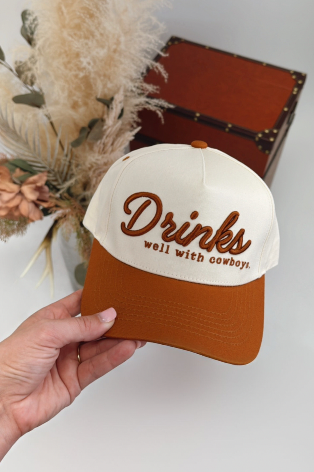 Drinks Well With Cowboys Trucker Hat