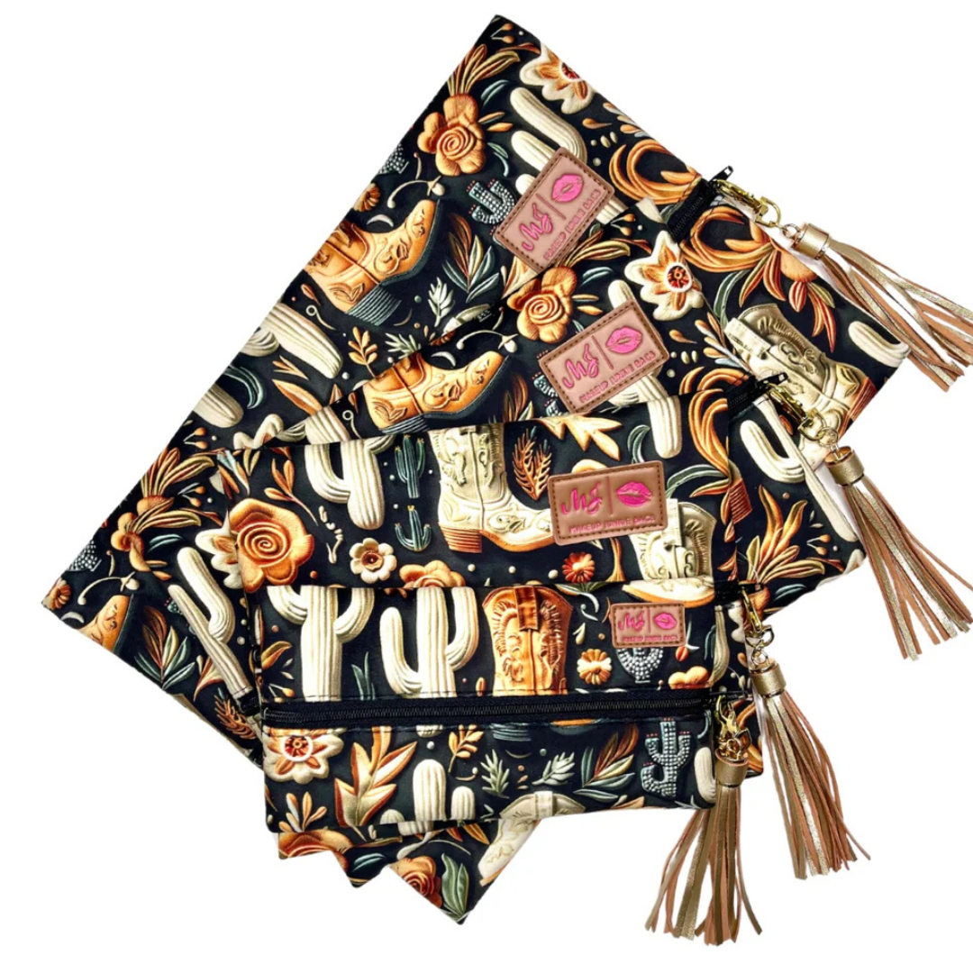 Boot Babe bags in mini, small, medium and large sizes, side‑by‑side to show size variations with same boot print design