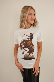 Stone-wash Bronco Dust tee with bold western graphic, relaxed cotton fit (women’s rustic style).