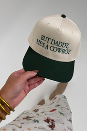Beige and green cowboy hat with embroidered ‘But Daddy, He’s a Cowboy’ slogan and classic western brim