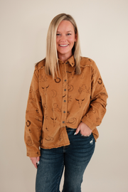 Soft corduroy western shirt in camel with snap buttons, chest pockets & relaxed fit.