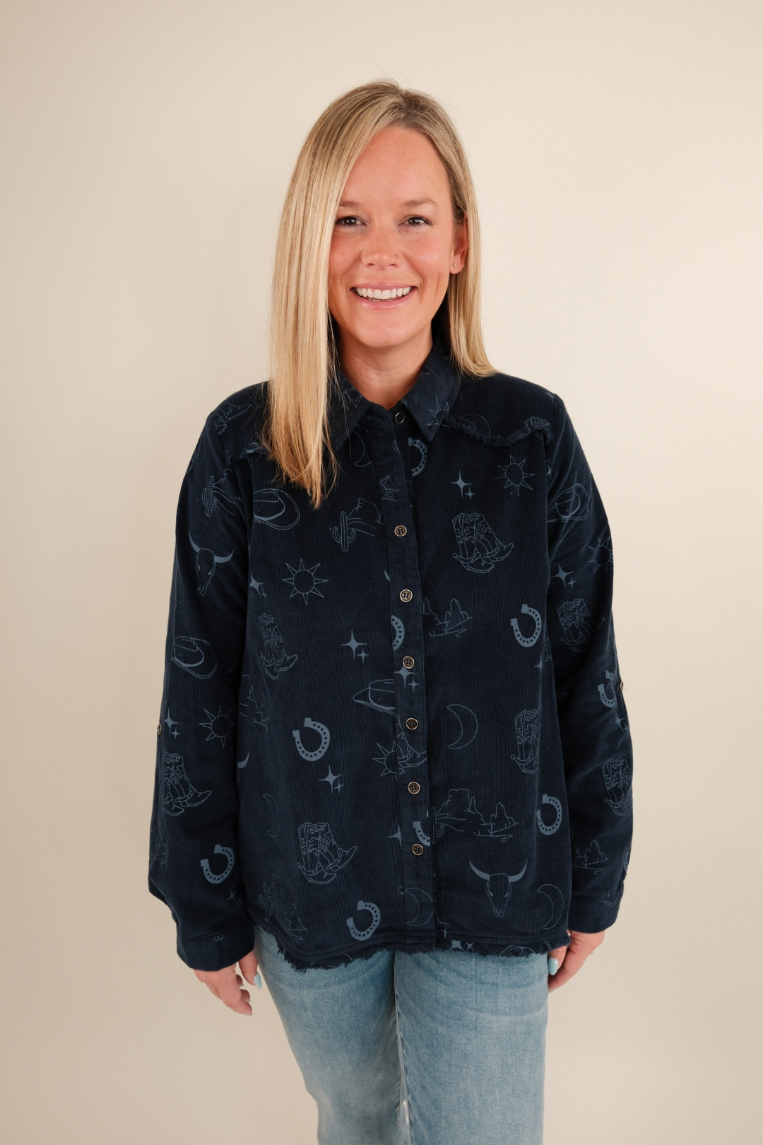 Soft corduroy western shirt in denim blue with snap buttons, chest pockets & relaxed fit.