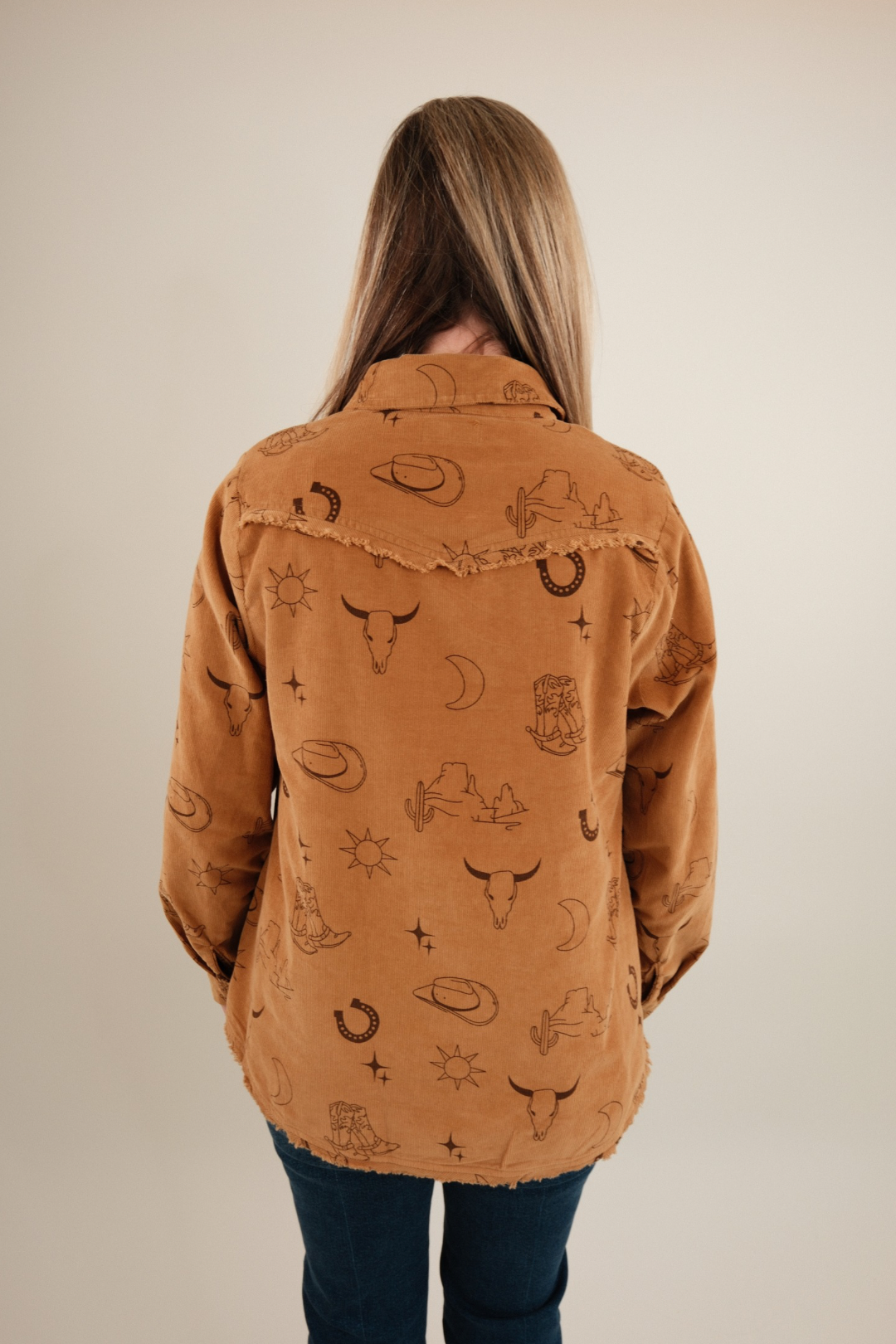 Front view of women’s Canyon Creek Corduroy Shirt in camel, snap-button cowgirl western shirt with chest pockets and collar.