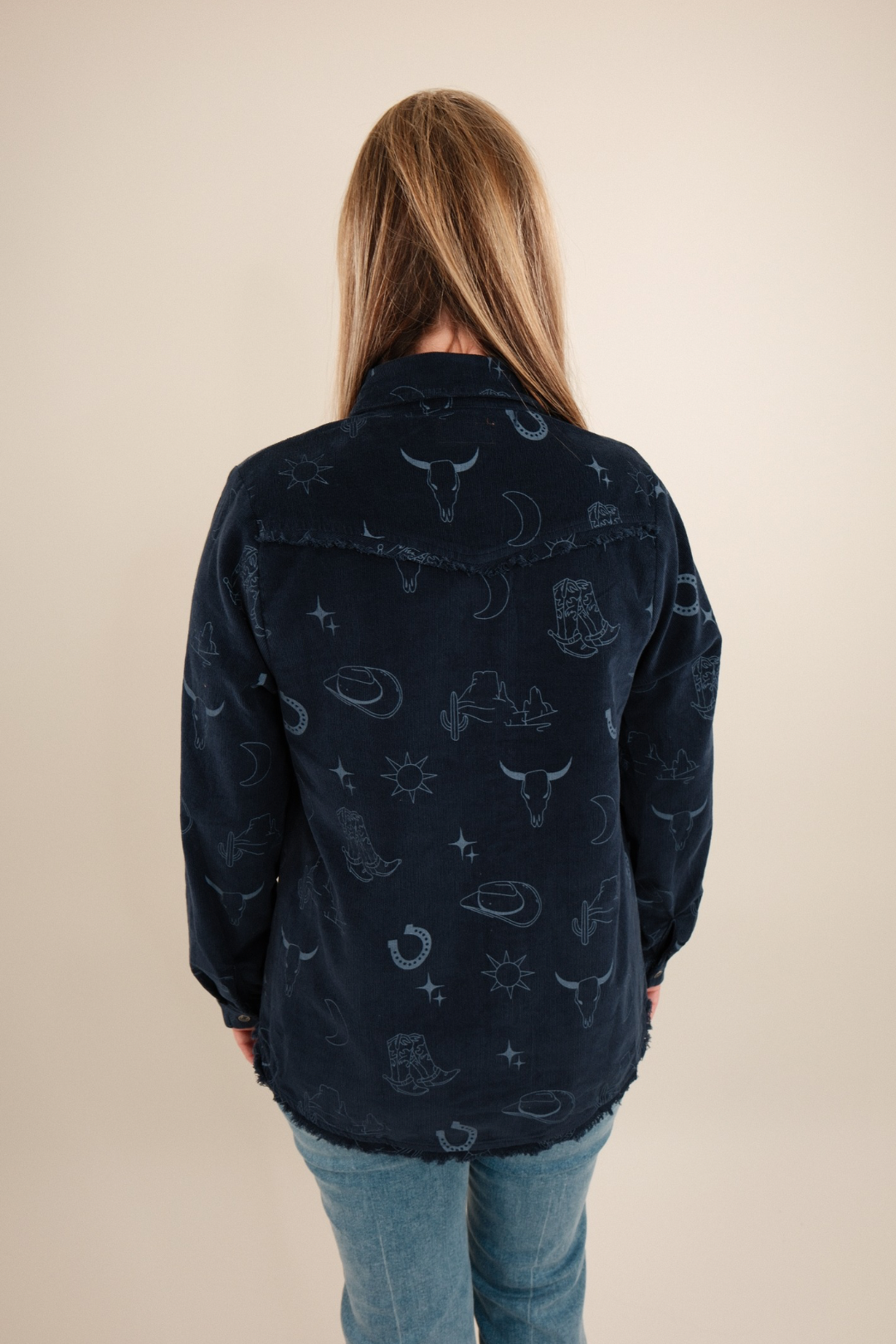Front view of women’s Canyon Creek Corduroy Shirt in denim blue, snap-button cowgirl western shirt with chest pockets and collar.”