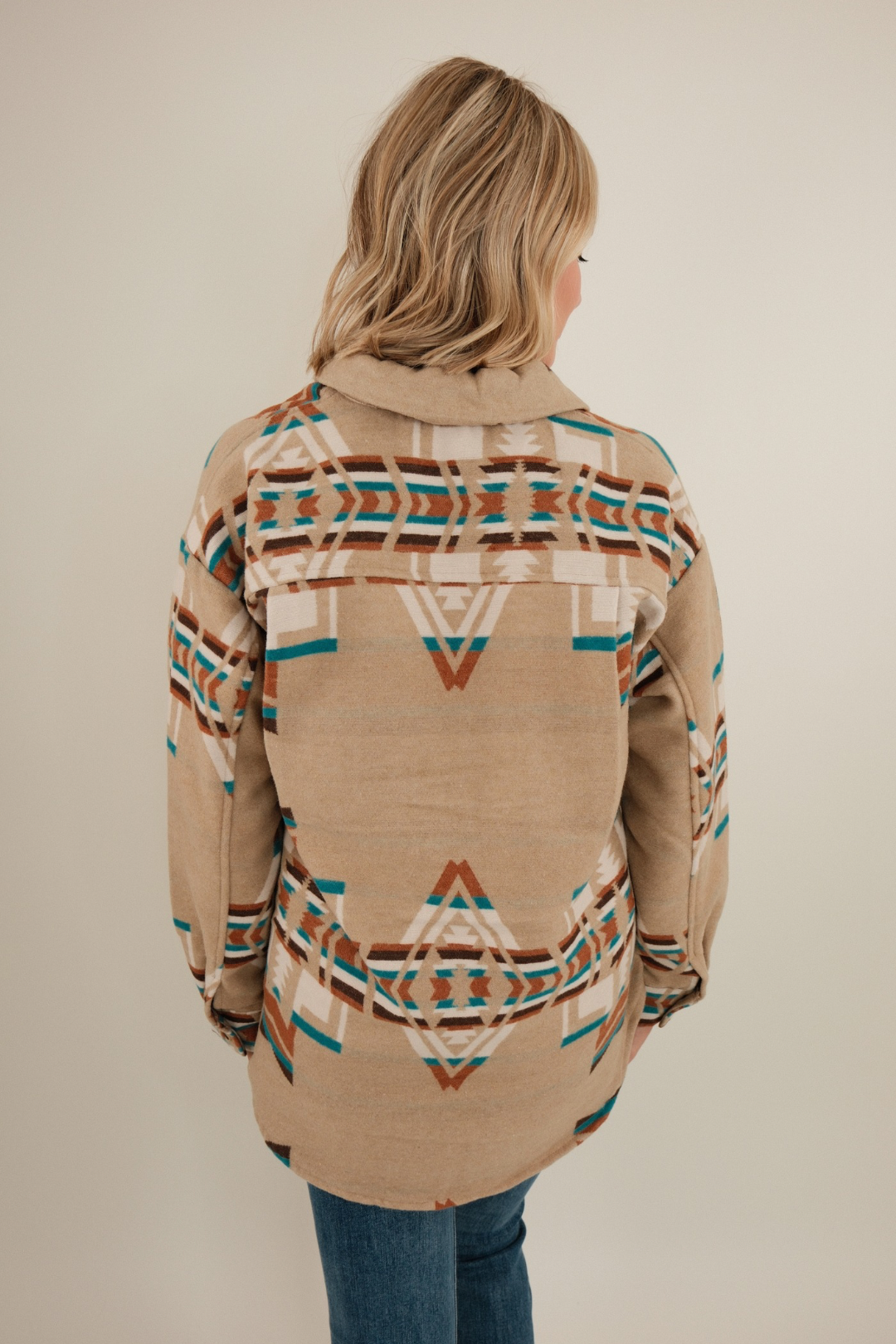 Back view of Canyon Crossroads Tunic Jacket featuring longline cut, clean western yoke detail and relaxed layering silhouette.