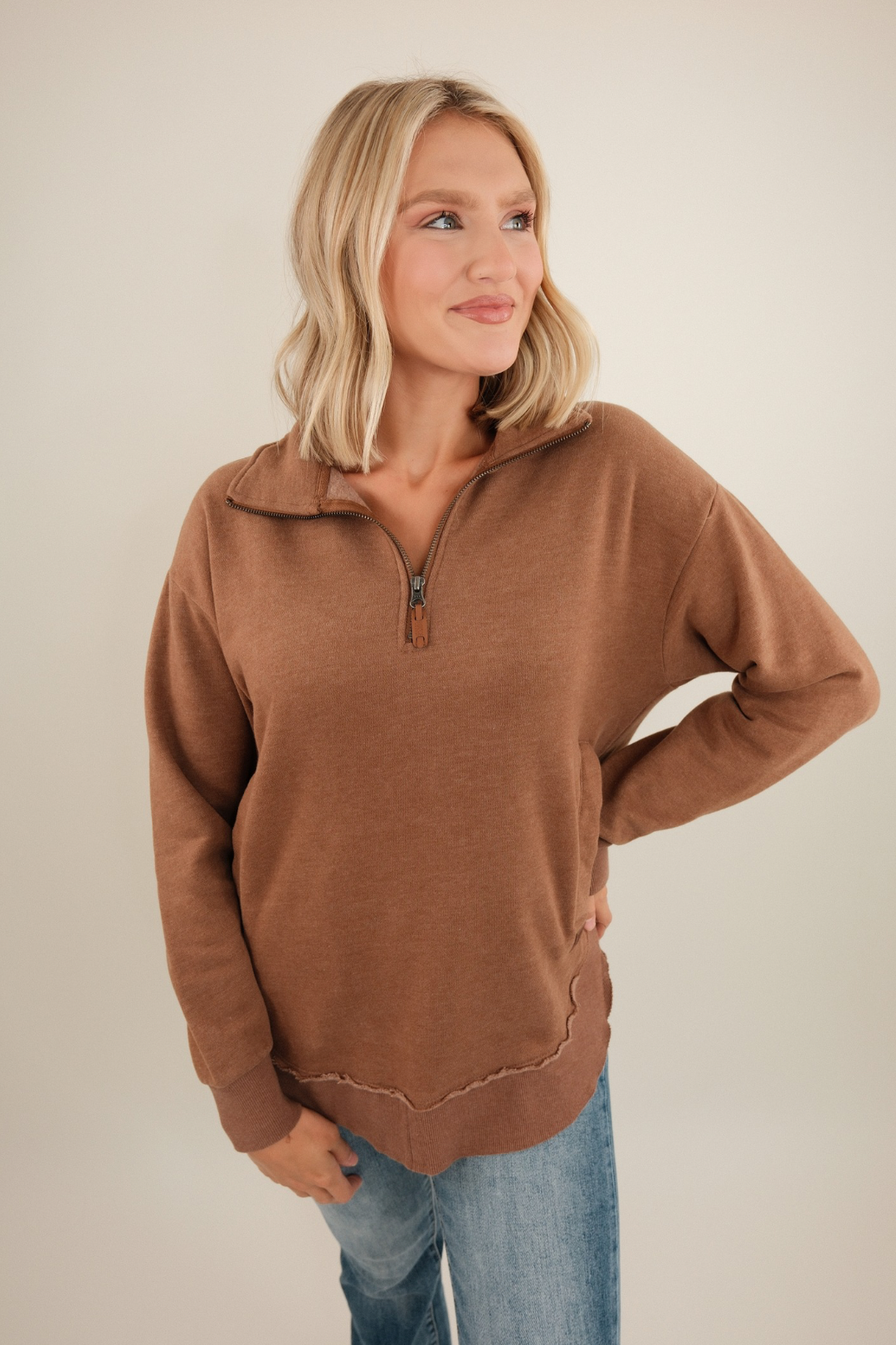 Earthy brown Canyon Trail quarter-zip fleece with mock neck, relaxed fit and soft brushed texture.