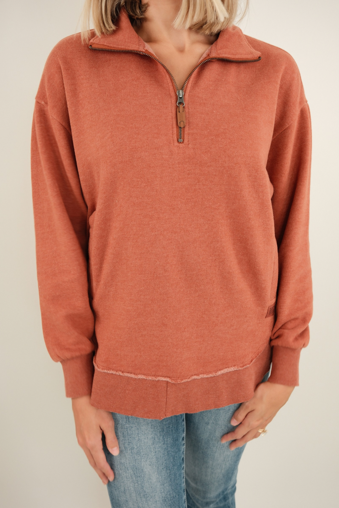 Front view of Canyon Trail Quarter-Zip Fleece in rich copper with mock neck, quarter-zip closure and relaxed fit.