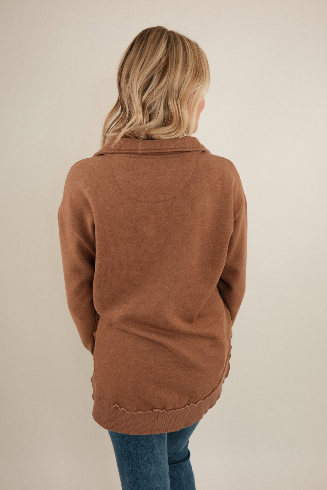Back view of Canyon Trail Quarter-Zip Fleece in earthy brown with clean silhouette and cozy western-inspired fit.