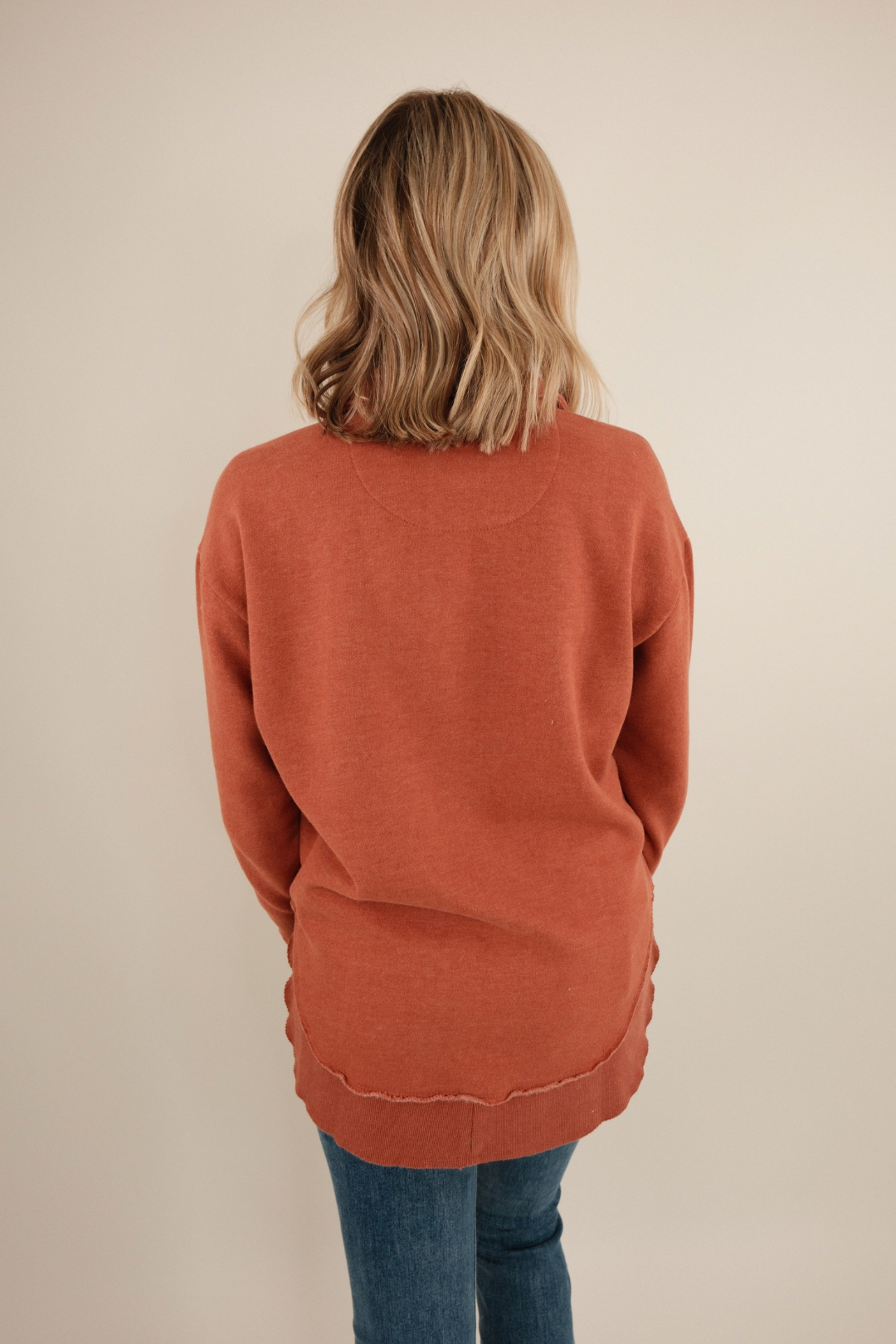 Back view of Canyon Trail Quarter-Zip Fleece in rich copper with clean silhouette and cozy western-inspired fit.
