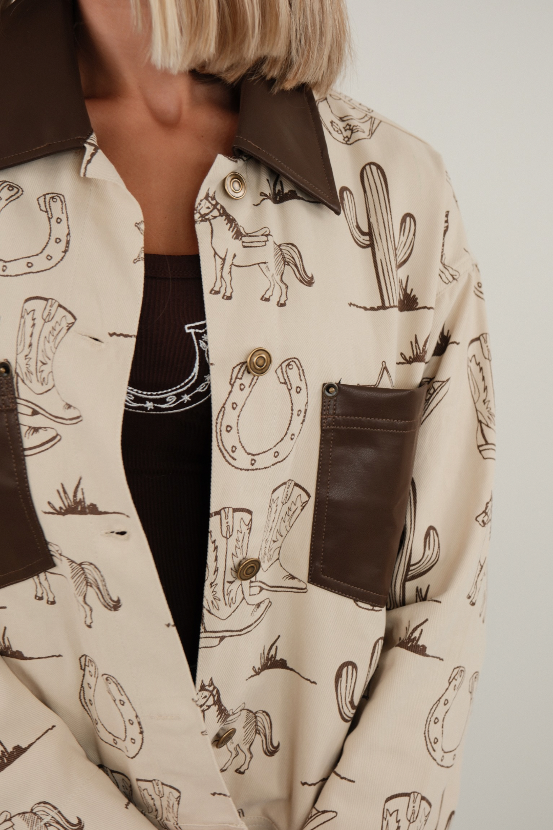 Cowboy Trails canvas jacket in durable fabric, chest pockets, button placket, and classic western outerwear design