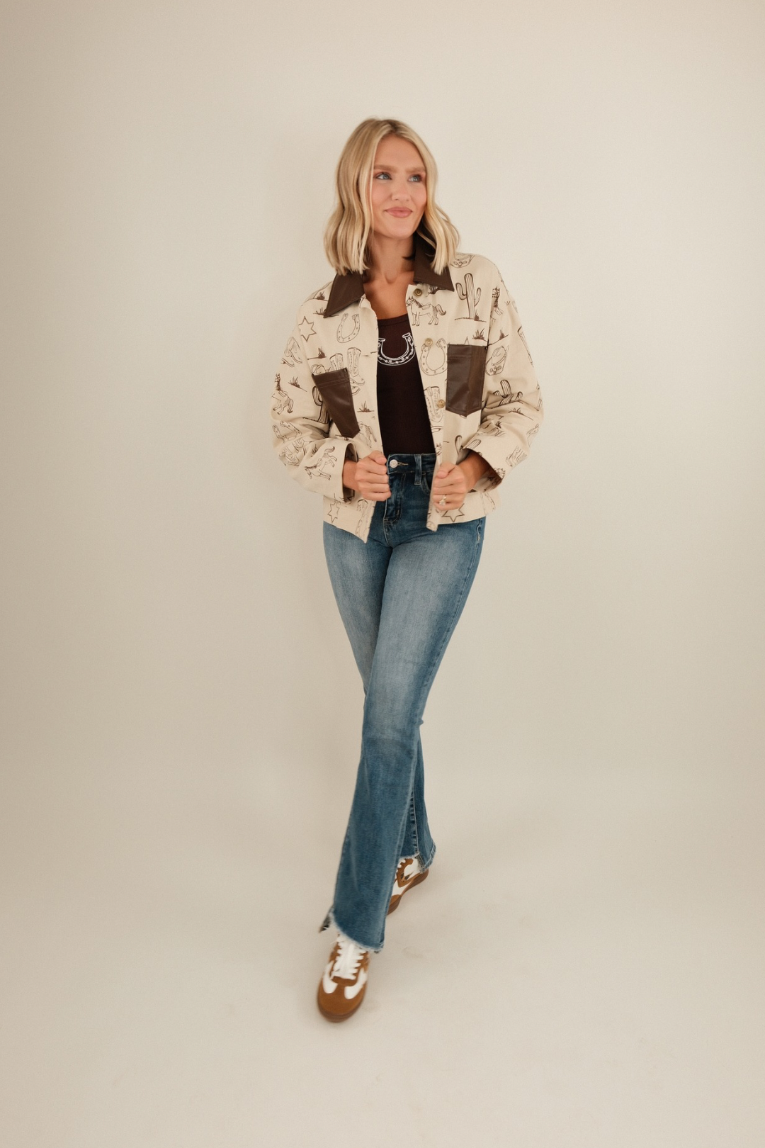 Close-up of Cowboy Trails Jacket highlighting canvas texture, button detail and sturdy sewing details.