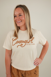 Women’s Cowgirl Connection Cropped Tee in vintage wash with western horseshoe and star graphic, boxy relaxed fit.