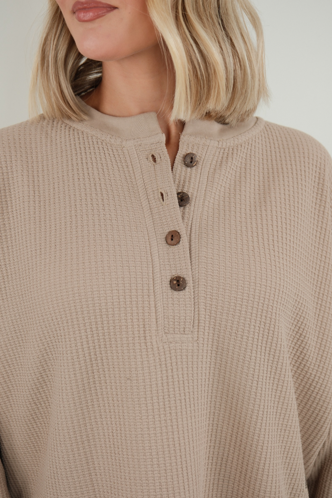 Desert Dune Waffle Henley in soft sand waffle knit with wooden buttons and rustic western layering style.