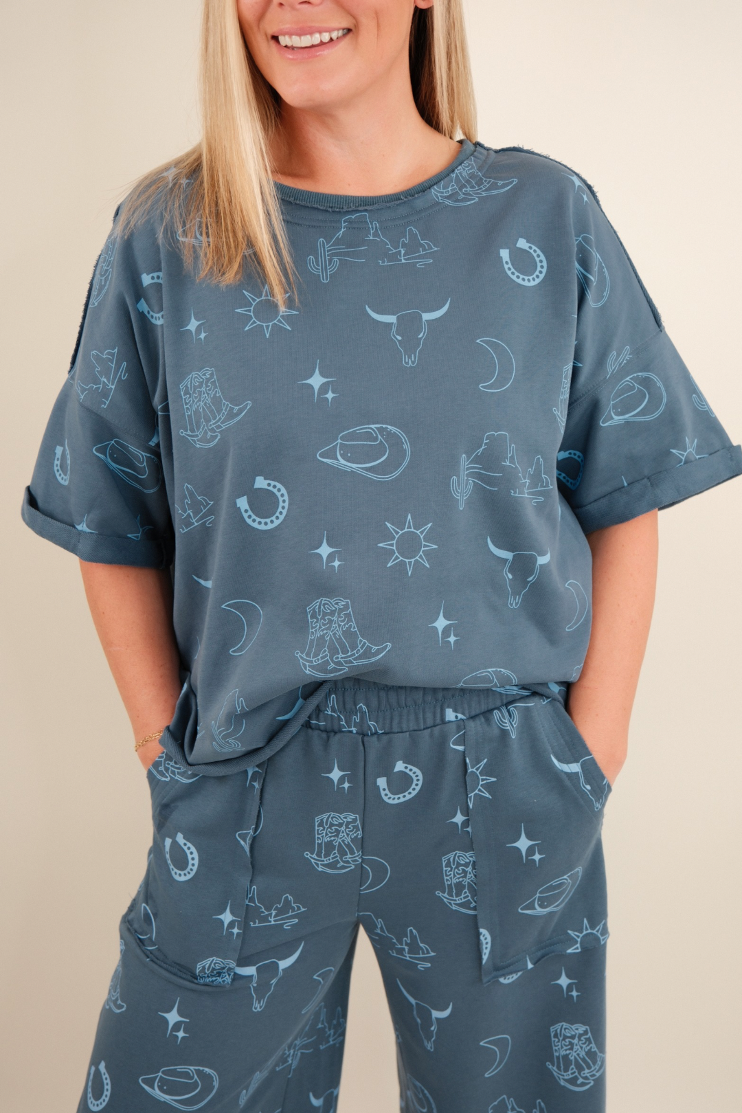 Women’s western Desert Horizon Set, loungewear with pullover top and wide-leg pants in denim and soft blue.