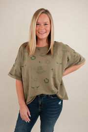 Stone-wash olive Desert Shadows tee with relaxed fit, classic crew neckline, and subtle western graphic detailing.