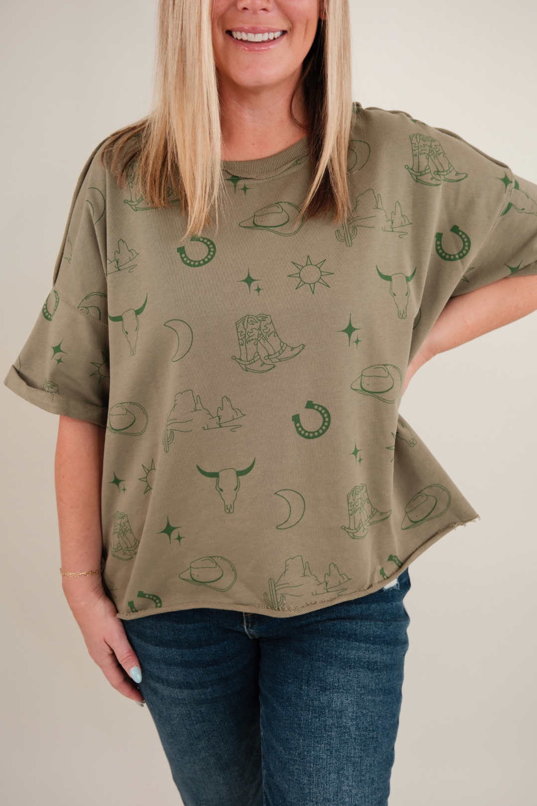 Front view of women’s Desert Shadows Tee in stone-wash green, western graphic t-shirt with relaxed fit and crew neckline.