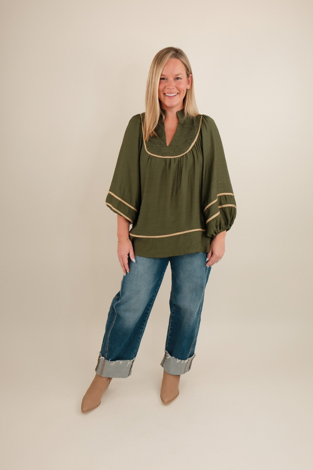 Golden Mesa Blouse highlighting textured golden fabric, tonal embroidery and western neckline for a chic cowgirl look.