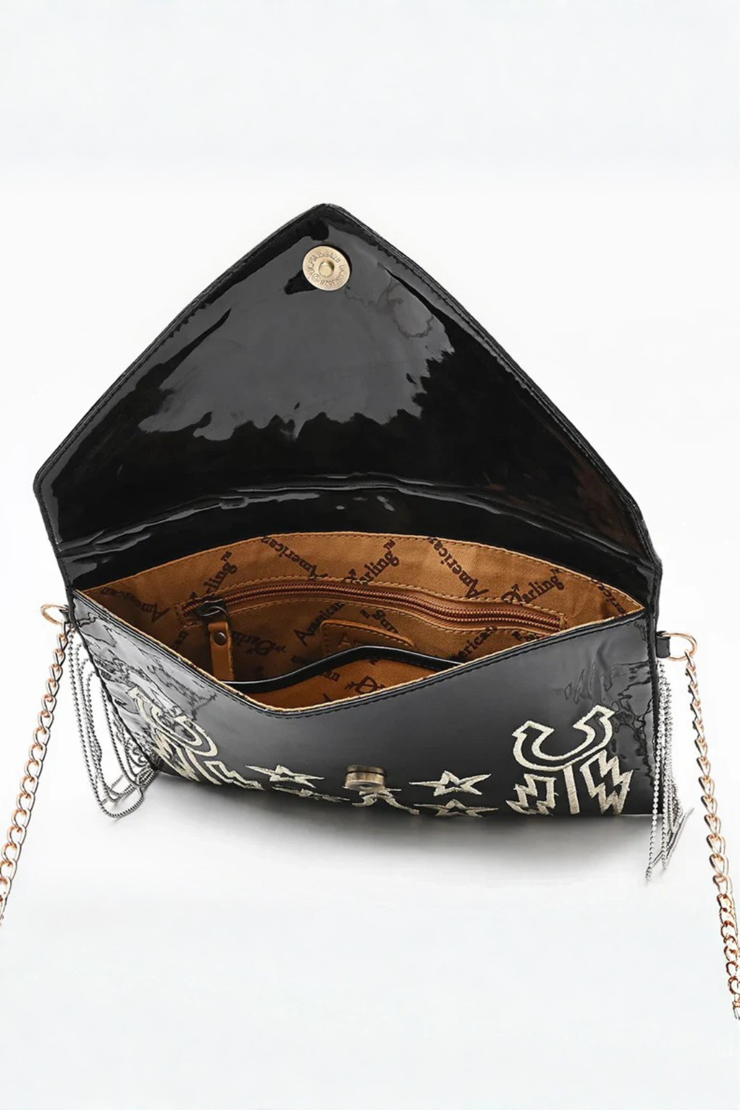 Black patent leather handbag with chain strap on a white background
