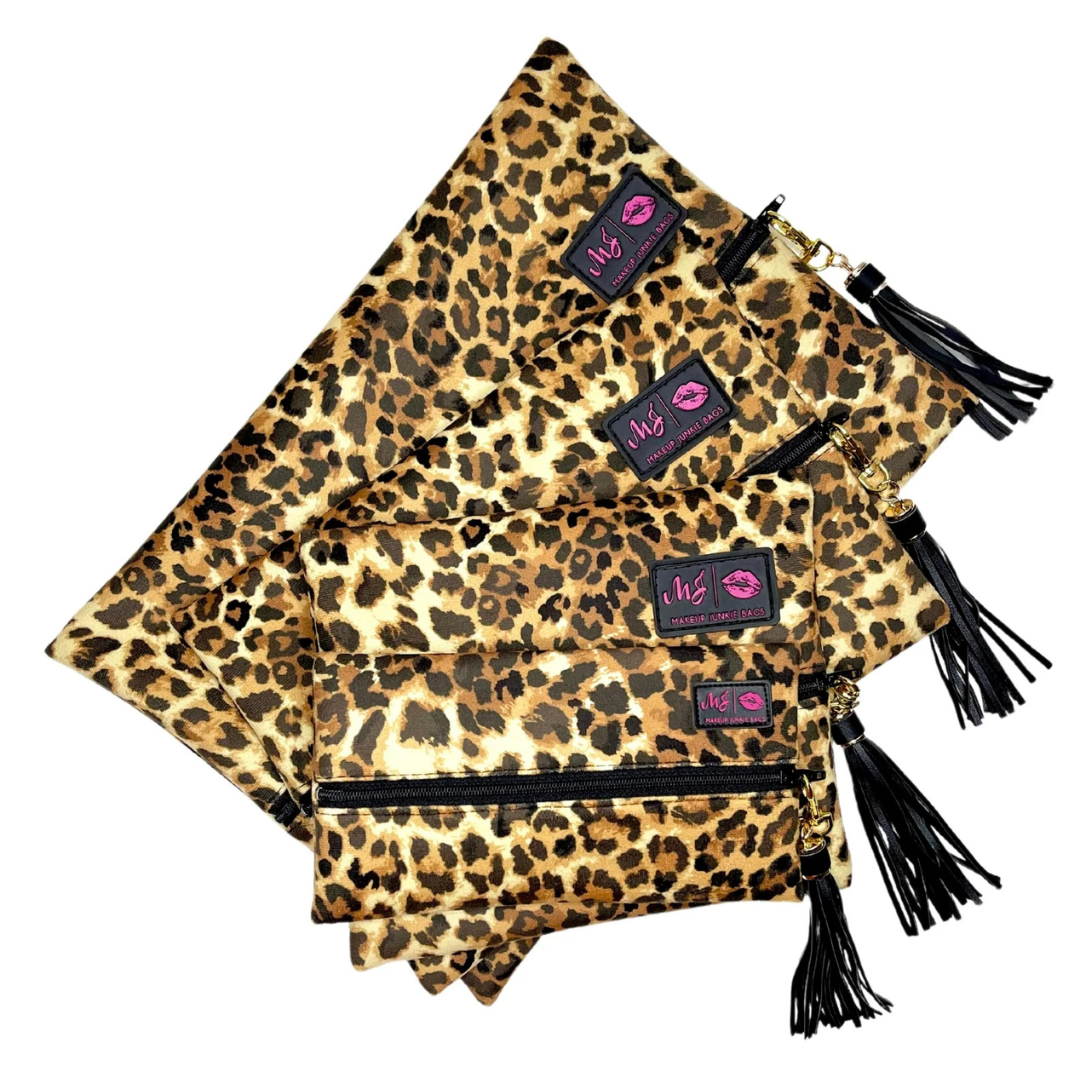Lady Leopard bags in small, medium and large sizes side by side to illustrate scale and consistent cream velvet leopard spot design.