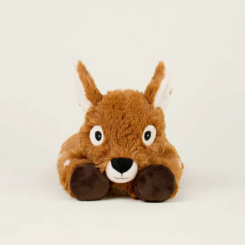 Laying Down Deer Warmies Plush displayed on blanket, microwavable plush deer offering warmth, lavender scent, and soothing comfort.
