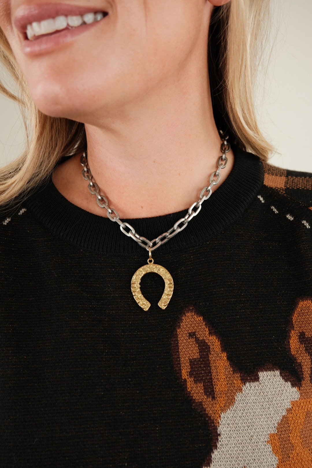 Lucky Charm Chain Necklace featuring chunky silver links and rustic gold horseshoe pendant — bold cowgirl jewelry with luxe western flair.