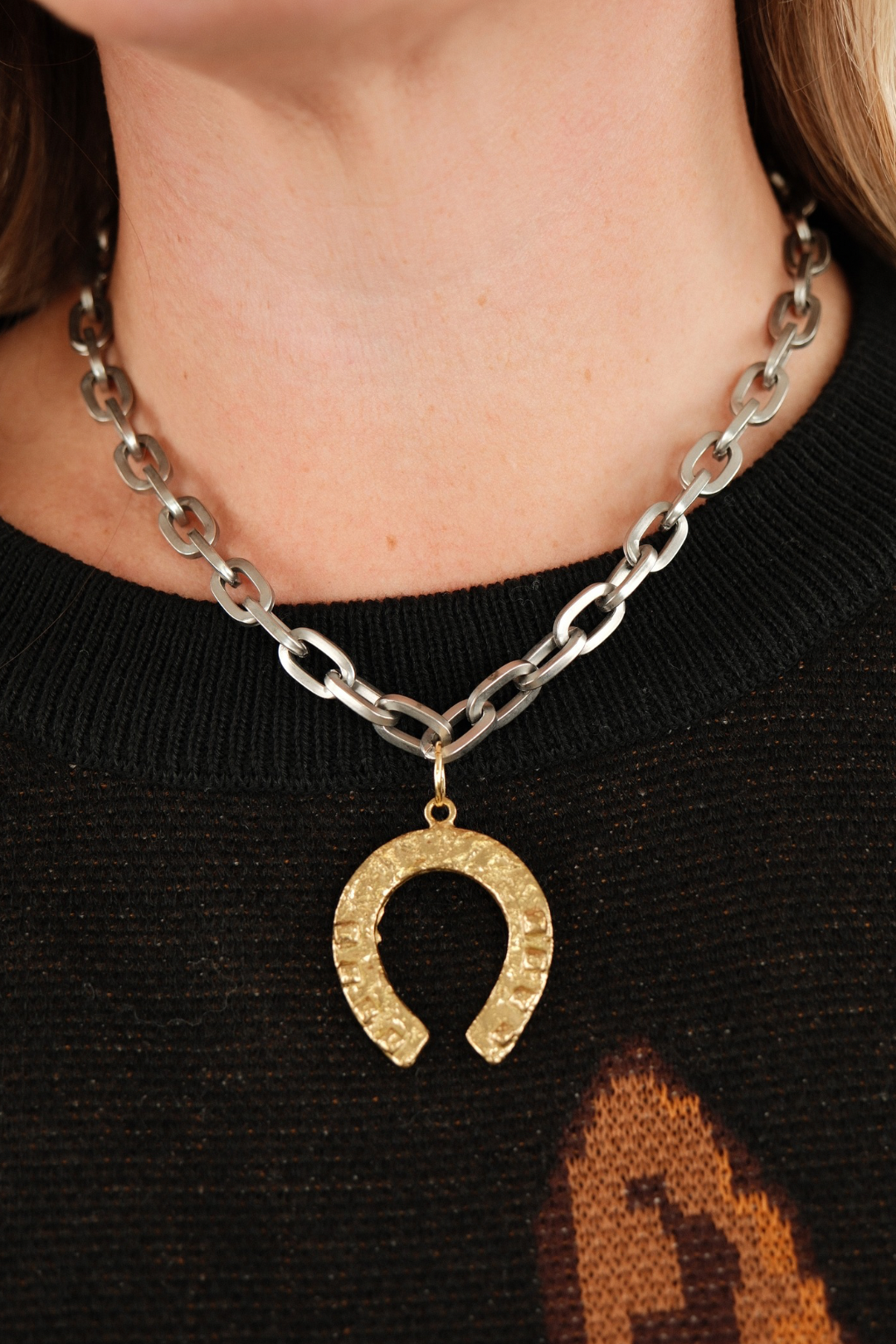 Front view of Lucky Charm Chain Necklace with chunky silver chain and rustic gold horseshoe pendant for bold western cowgirl style.