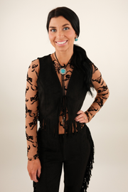 Model wearing Midnight Fringe Suede Vest, black suede cowgirl outfit with fringe detail styled western chic.