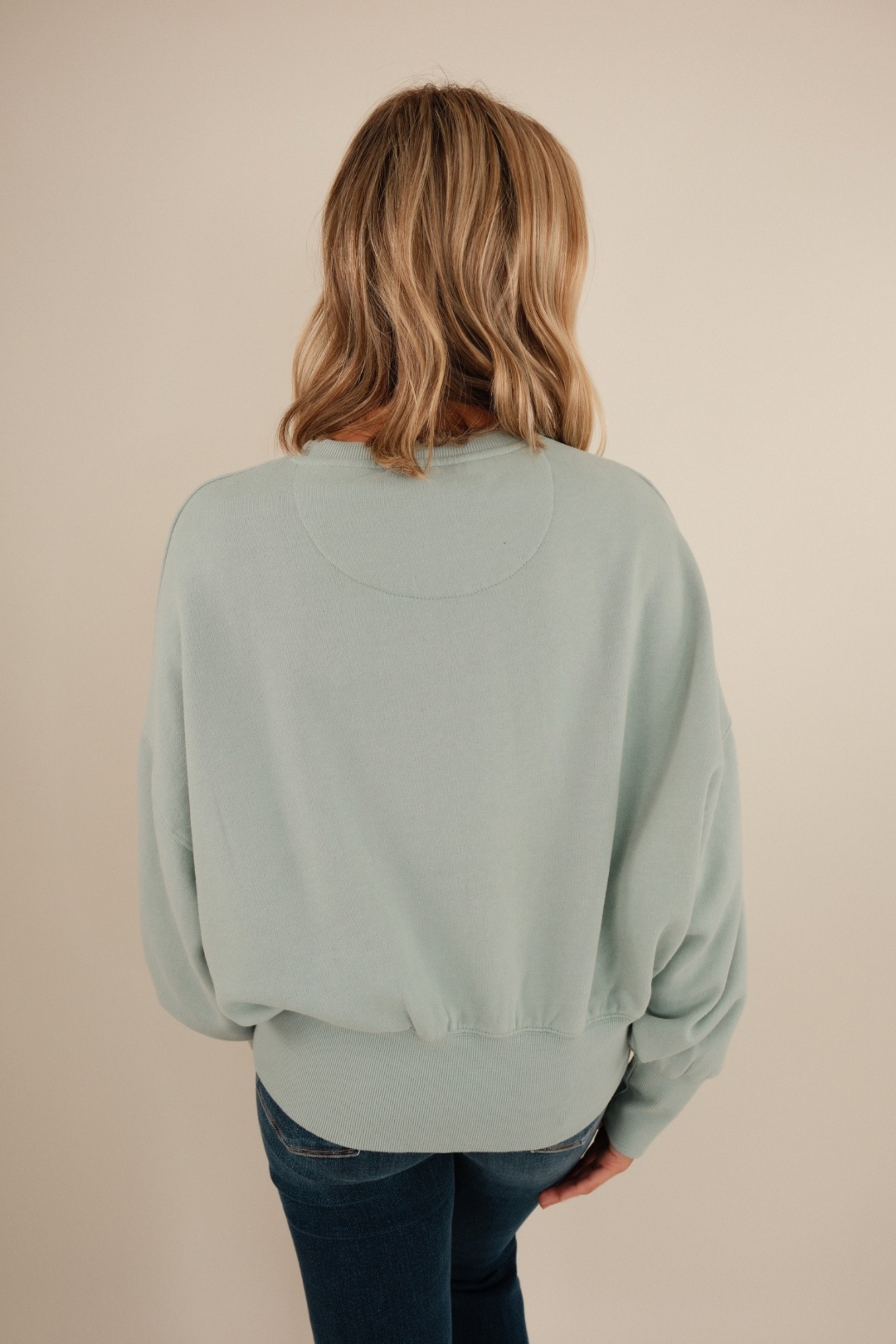 Back view of Misty Sky Waist-Length Fleece in sky blue with clean silhouette and cozy western-inspired fit.