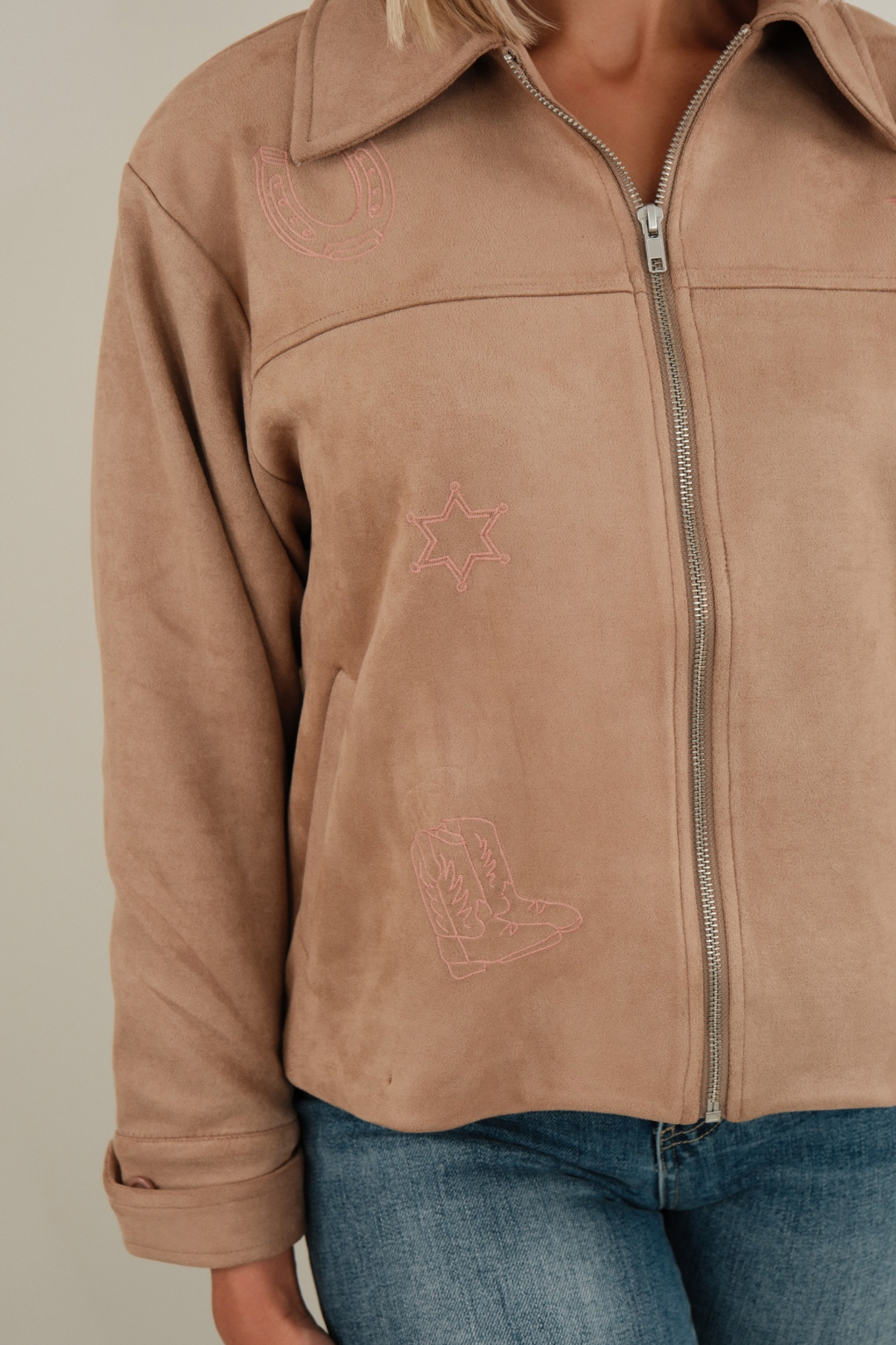 Close-up of Mocha Mirage suede jacket highlighting suede texture and western seam detail.