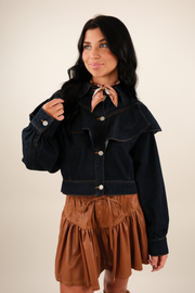 Women’s Rodeo Ruffle Denim Jacket, cropped dark wash western jean jacket with dramatic ruffle across chest and shoulders.