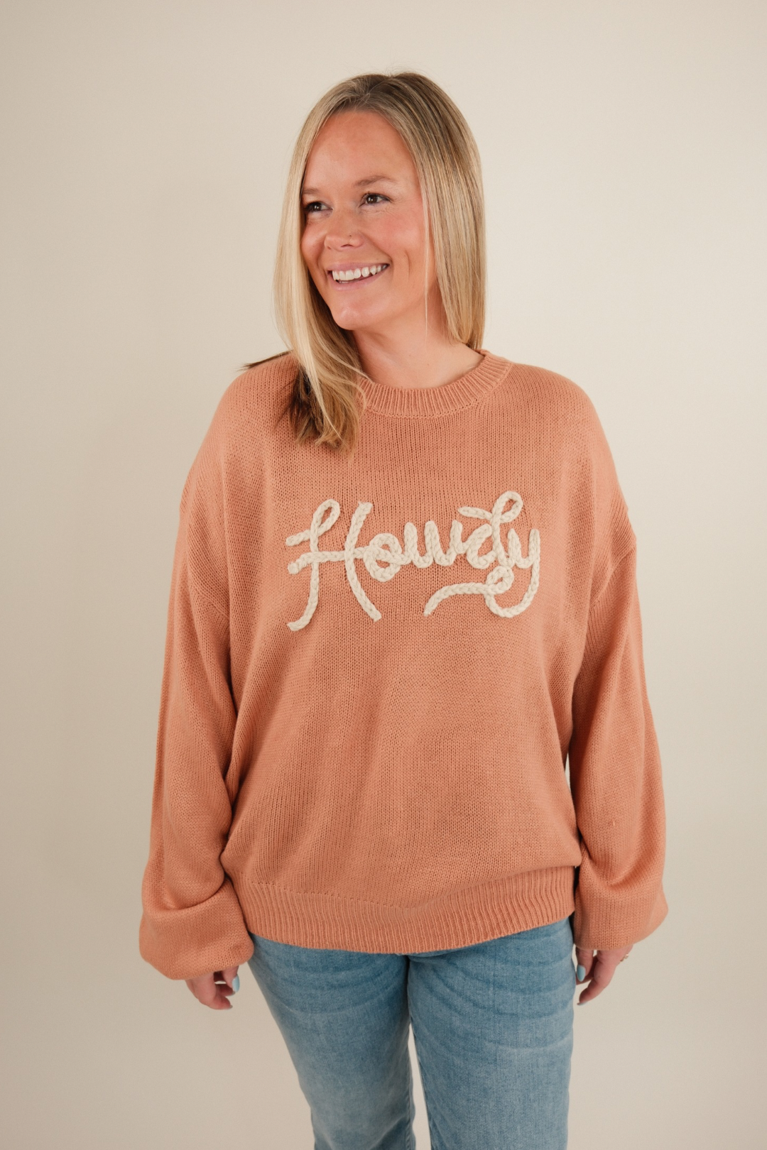 Women’s Rope & Howdy Sweater in clay knit with rope-stitched ‘Howdy’ across chest, western cowgirl sweater with relaxed fit.