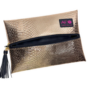 Front view of Rose Gold Python Makeup Junkie bag with rose‑gold python‑print exterior, black zippered front, and matching tassel.