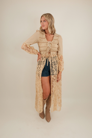 Women’s Saddlewood Lace Duster, western maxi duster with tan cotton bodice, tie-front closures, lace ruffles and sheer floral lace skirt.