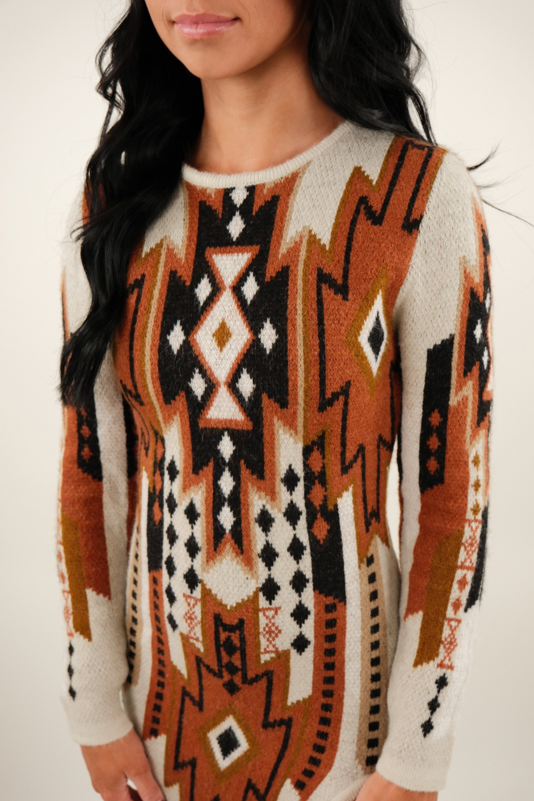 Close-up of Sierra Sunset Sweater Dress highlighting ivory knit texture, ribbed details and soft fabric.