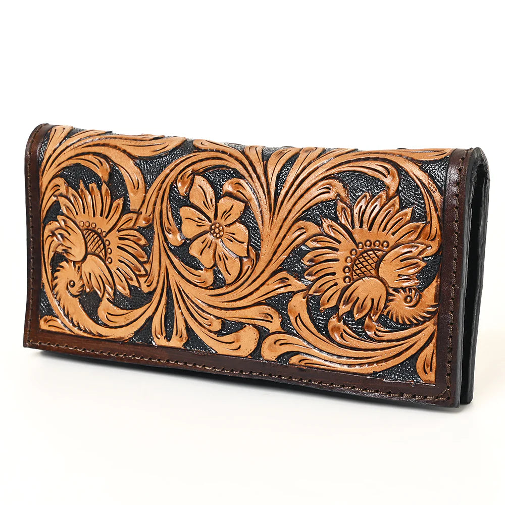 Leather wallet with floral tooled design on a white background.