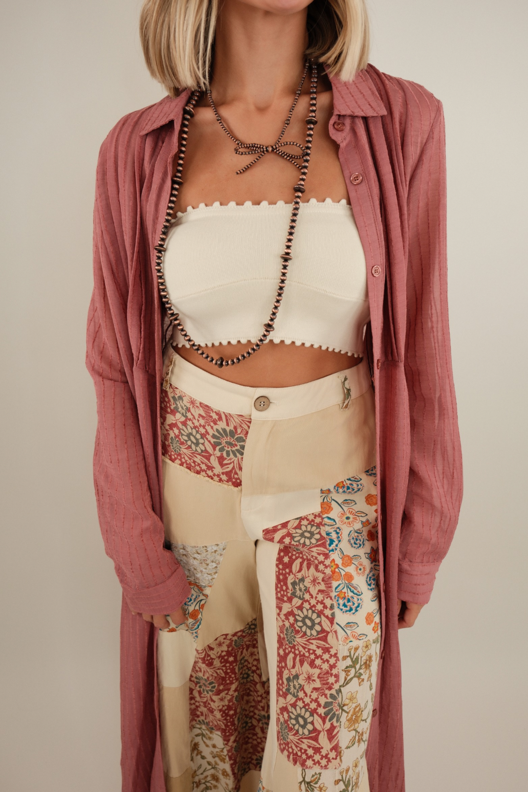Stargazer Star Duster showing gauzy fabric, long sleeve design and breezy western-inspired movement.