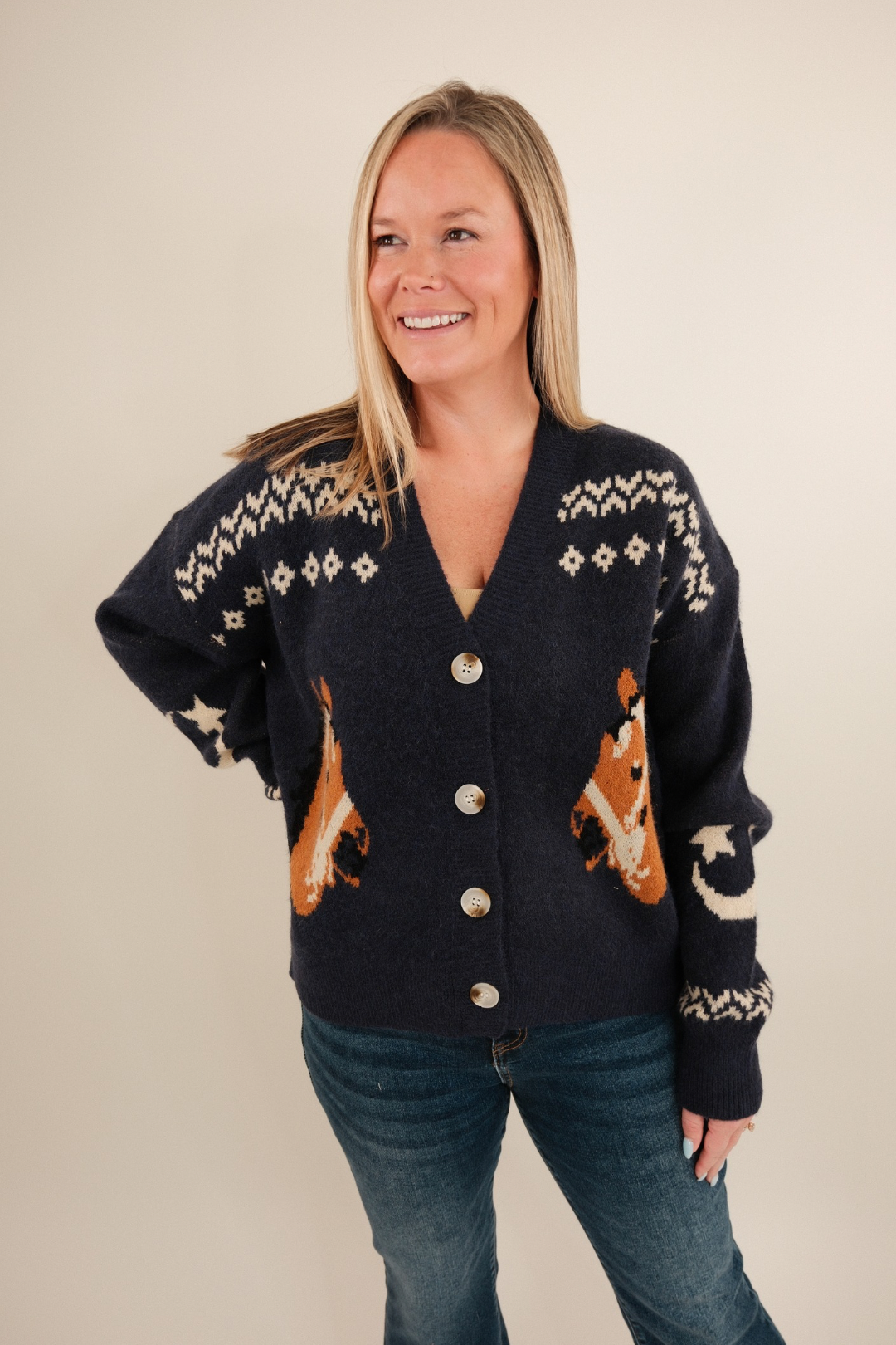 Navy knit Starlight Mustang cardigan with horse motifs, button-front, western style layering piece.