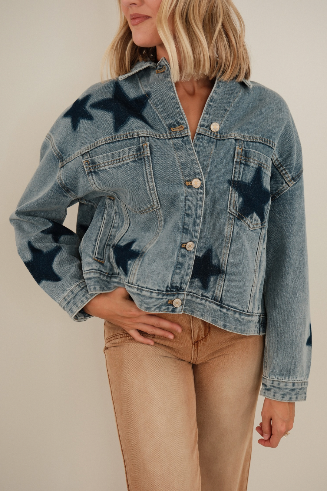 Starlit Range Denim Jacket featuring dark denim star patches on mineral wash with classic western yoke seam.