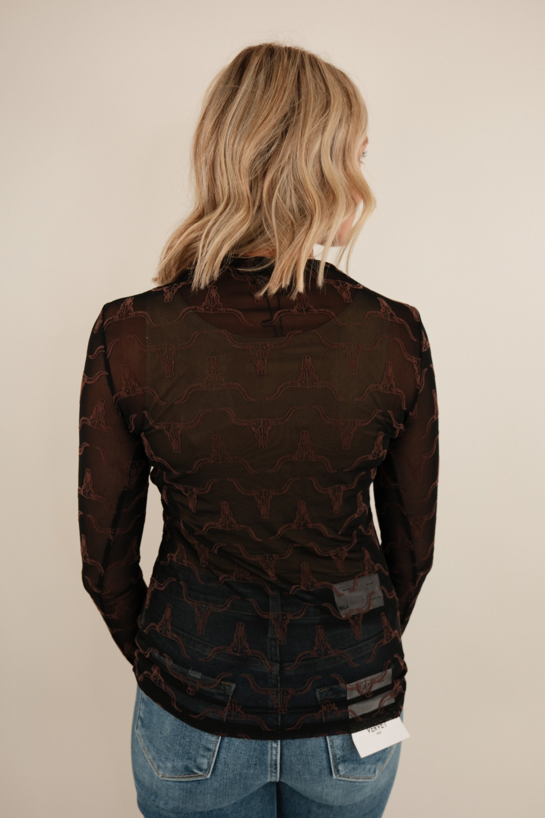 Back view of Velvet Longhorn Mesh Top, women’s black mesh blouse with brown velvet longhorn western detail.