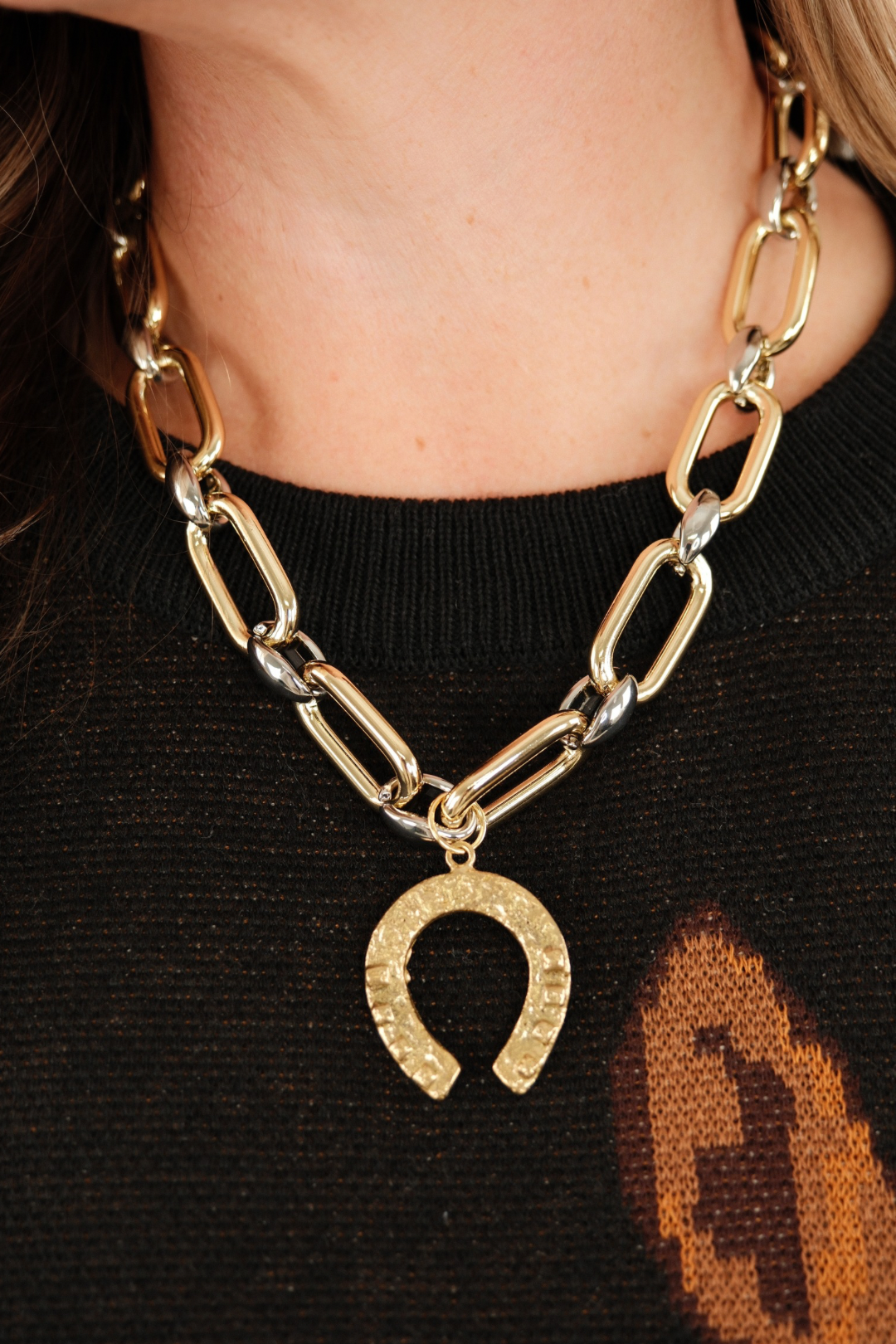 Western Luck Mixed Metal Necklace showing dual-tone silver and gold chain with elegant gold horseshoe pendant.