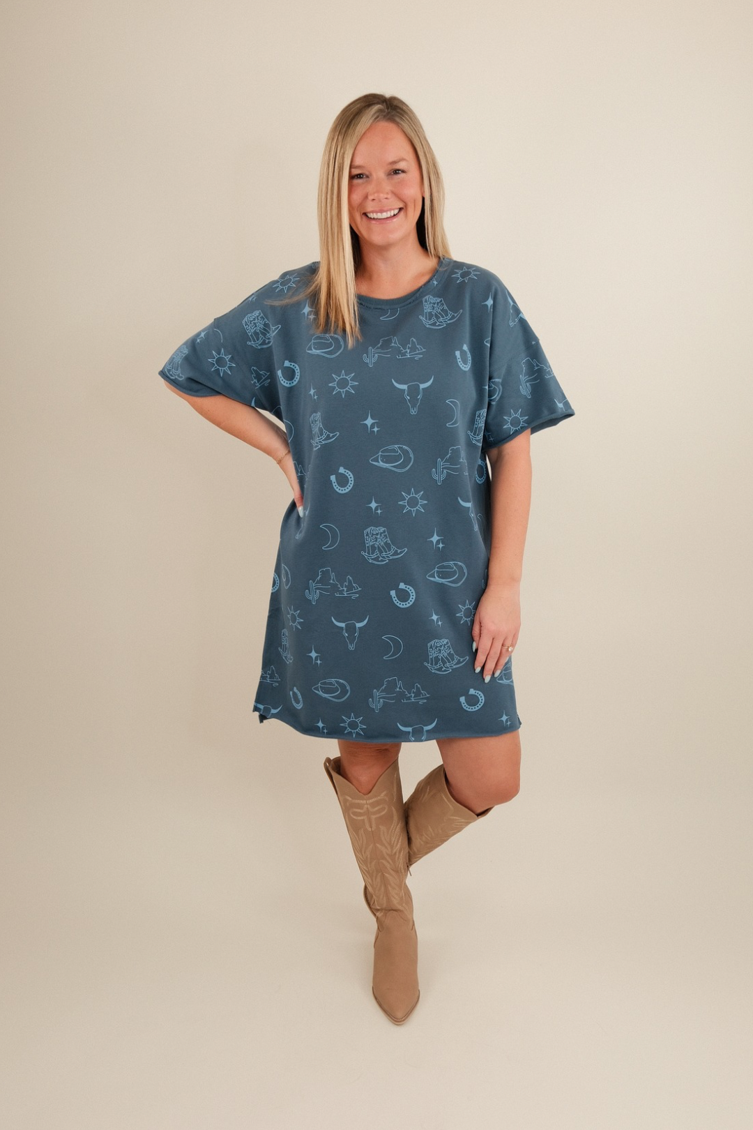 Dusty blue Western Skies tee dress with short sleeves, relaxed fit, and subtle western vibe.